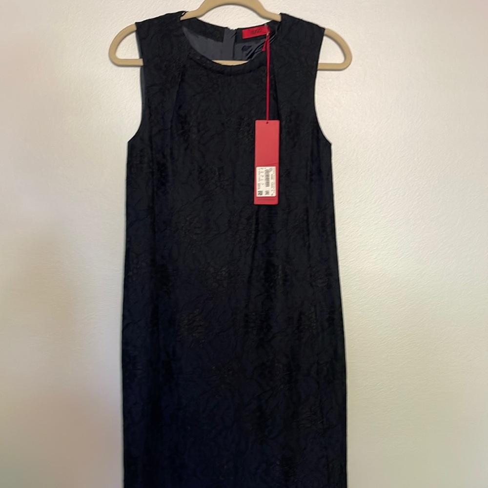 Dark Navy Blue just below the knees for 5.2 figure. Fitted and lined